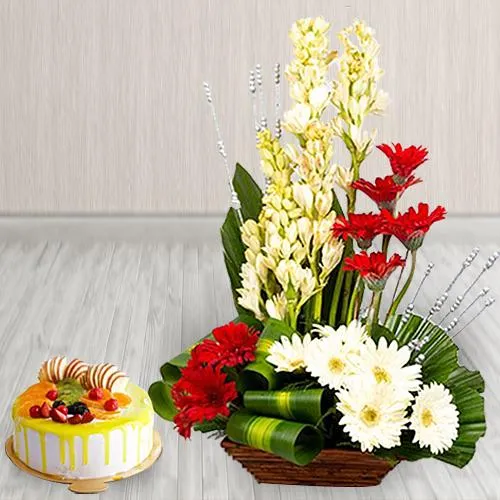 Captivating Combo of Fresh Flowers Arrangement with Mango Flavor Cake from Pune Online Florists