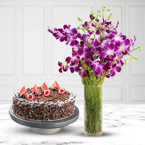 Send Baby Forest With Half Chocolate cake and 16 Pcs Ferrero Rocher  Chocolates to India | Basket Arrangement Of 6 Purple Orchids, 6 Pink  Carnations And 6 Red Roses With Half Chocolate